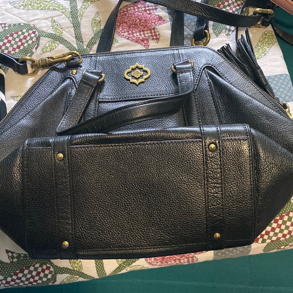 Cute black and gold leather handbag